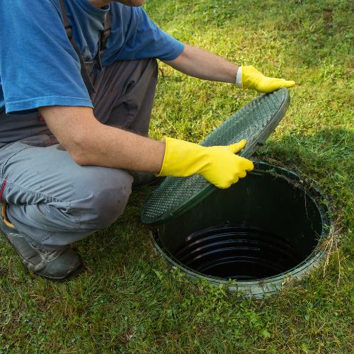 Champion Septic Tank specialists ensuring optimal performance of a residential septic system.