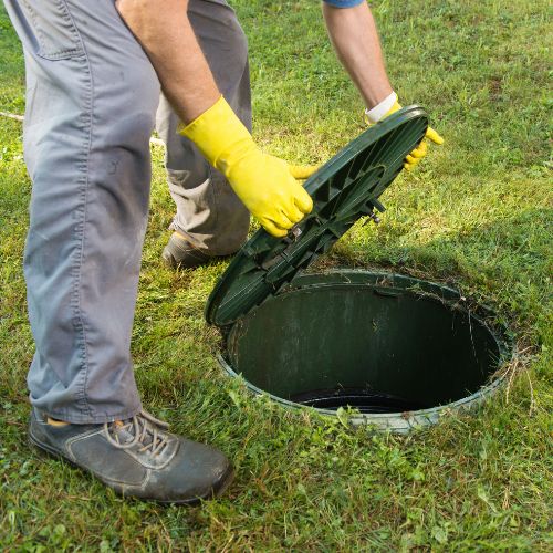 Champion Septic Tank crew providing top-notch septic system care and maintenance.